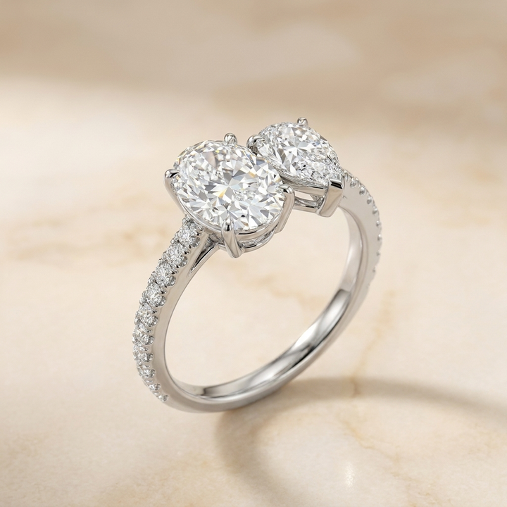 14K White Gold Selena Select Toi et Moi Oval & Pear Pavé Band Lab Diamond Engagement Ring - Alt angle on warm marble