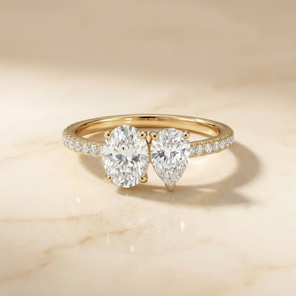 14K Yellow Gold Selena Select Toi et Moi Oval & Pear Pavé Band Lab Diamond Engagement Ring - Hero on warm marble