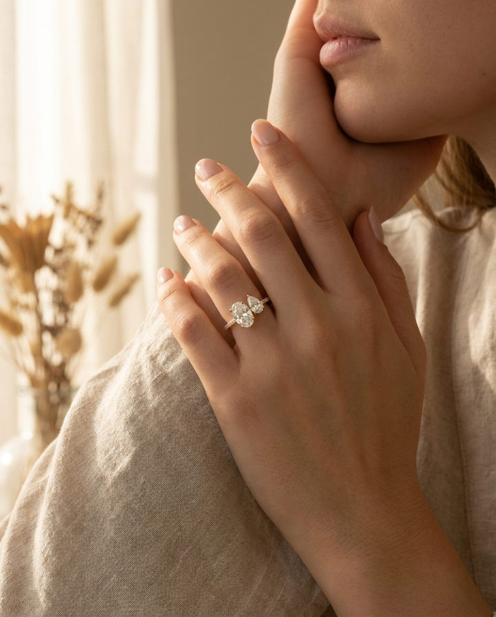 14K Yellow Gold Selena Select Toi et Moi Oval & Pear Pavé Band Lab Diamond Engagement Ring - Lifestyle scene with hand model