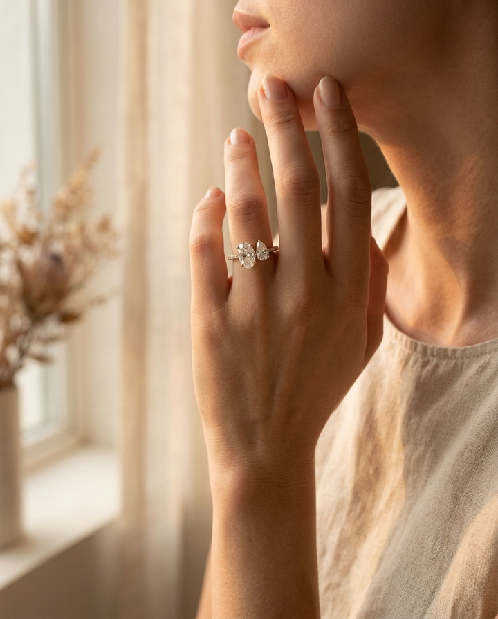 18K Yellow Gold Selena Select Toi et Moi Oval & Pear Pavé Band Lab Diamond Engagement Ring - Lifestyle scene with hand model