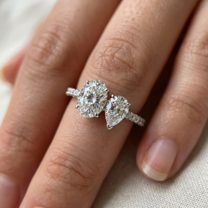 Platinum Selena Select Toi et Moi Oval & Pear Pavé Band Lab Diamond Engagement Ring - Macro close-up on finger