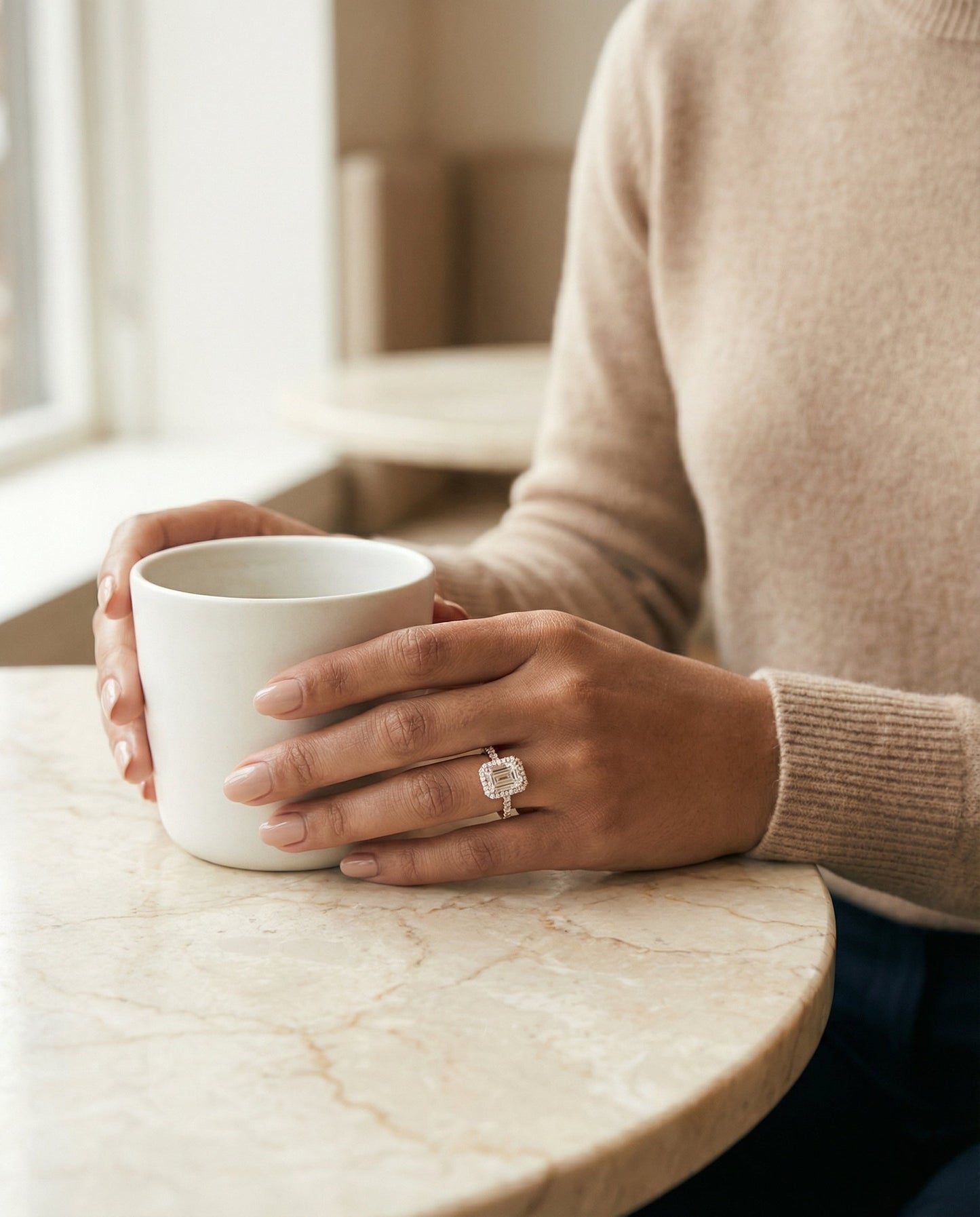 European Cut, Shared Prong Halo Emerald, in 14K Rose Gold – lifestyle shot | RockHer