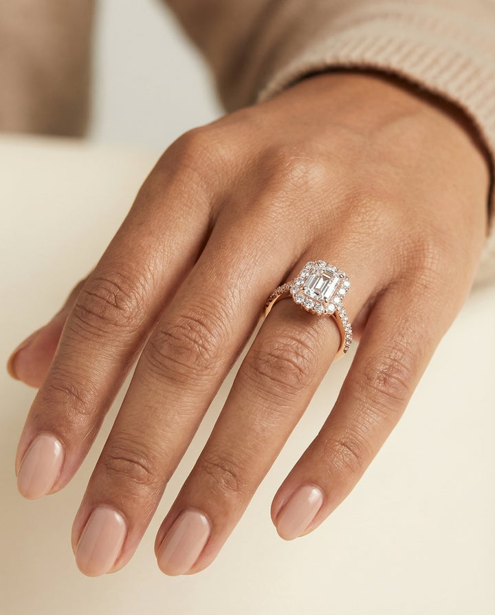 European Cut, Shared Prong Halo Emerald, in 14K Rose Gold – lifestyle shot | RockHer