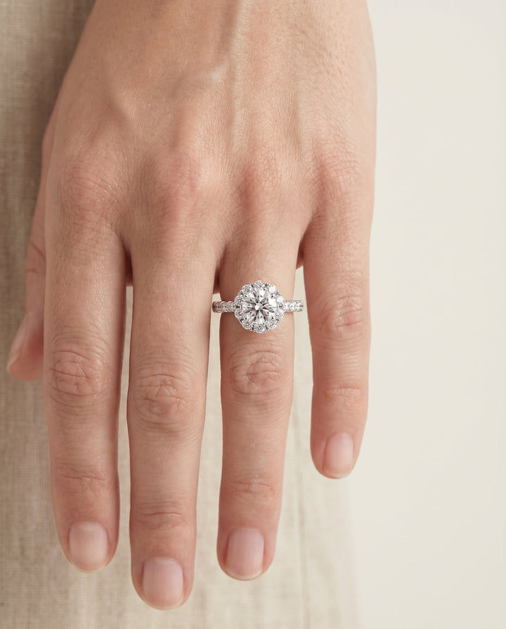 Round Brilliant, Shared Prong Halo Linear Band, in 18K White Gold – lifestyle shot | RockHer