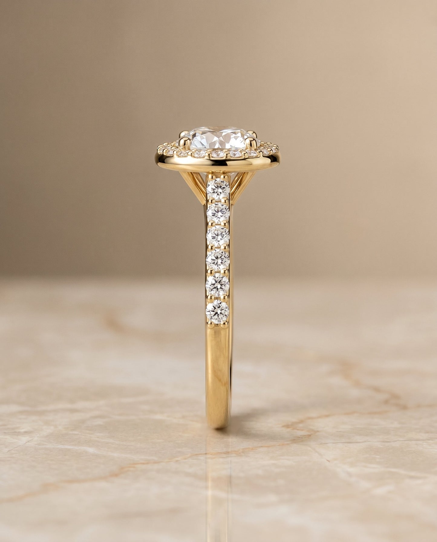 Round Brilliant, Shared Prong Halo Round, in 18K Yellow Gold, pave setting – side profile | RockHer