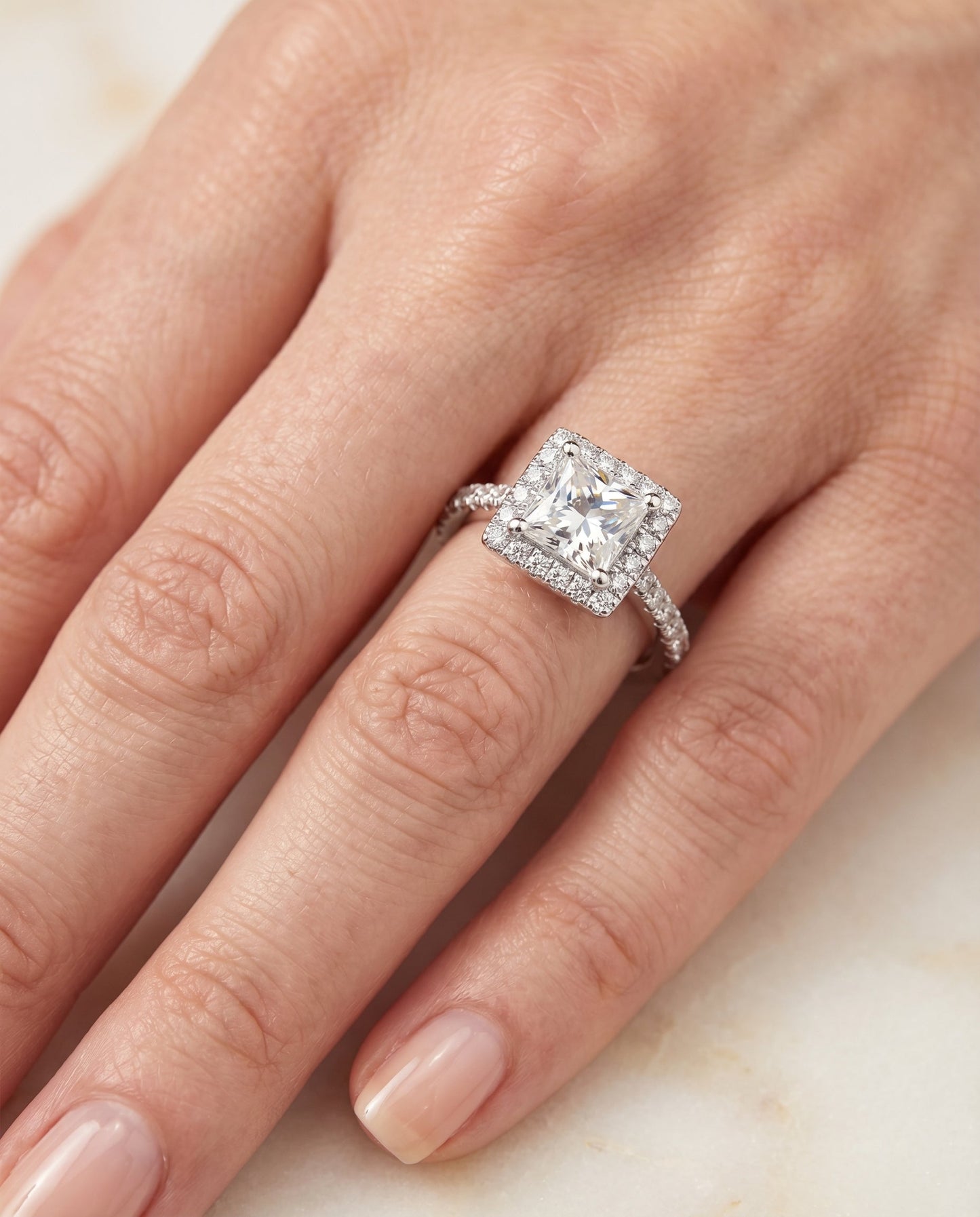 Shared Prong Pavé Halo Princess, in Platinum, pave setting – lifestyle shot | RockHer
