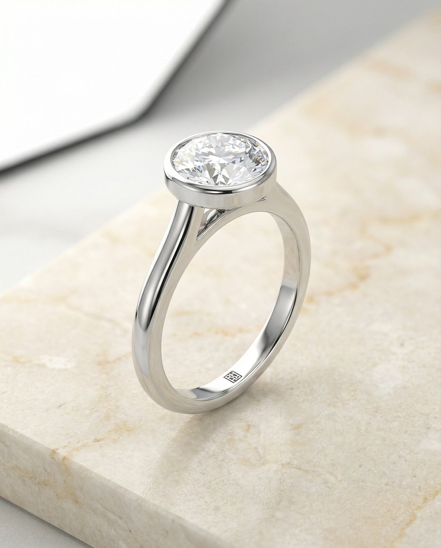Round Brilliant, Simple Bezel Solitaire, in Platinum – front view | RockHer