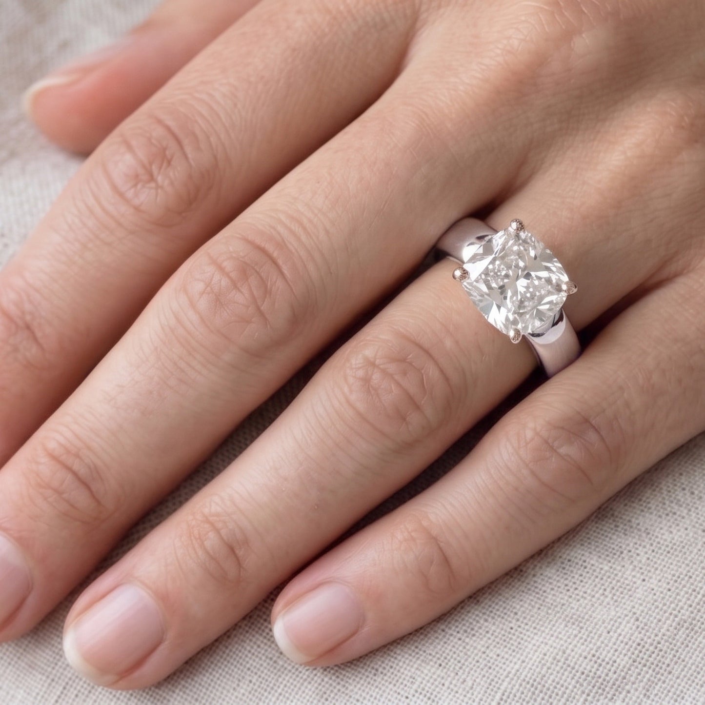 Cushion Bold Band Solitaire, in 18K White Gold, prong setting – detail view | RockHer
