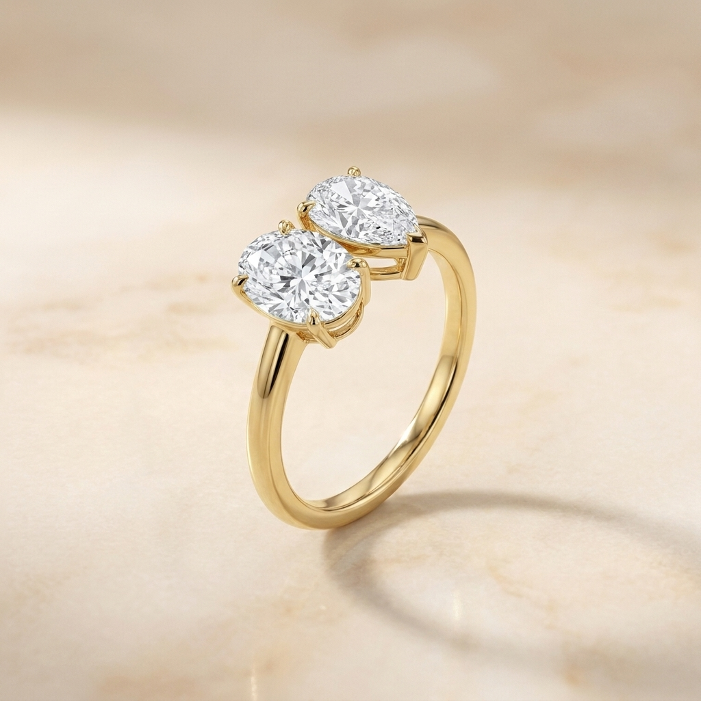 14K Yellow Gold Solange Toi et Moi Select Oval & Pear Lab Diamond Engagement Ring - Alt angle on warm marble