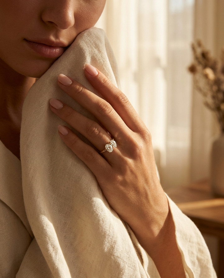 14K Yellow Gold Solange Toi et Moi Select Oval & Pear Lab Diamond Engagement Ring - Lifestyle scene with hand model