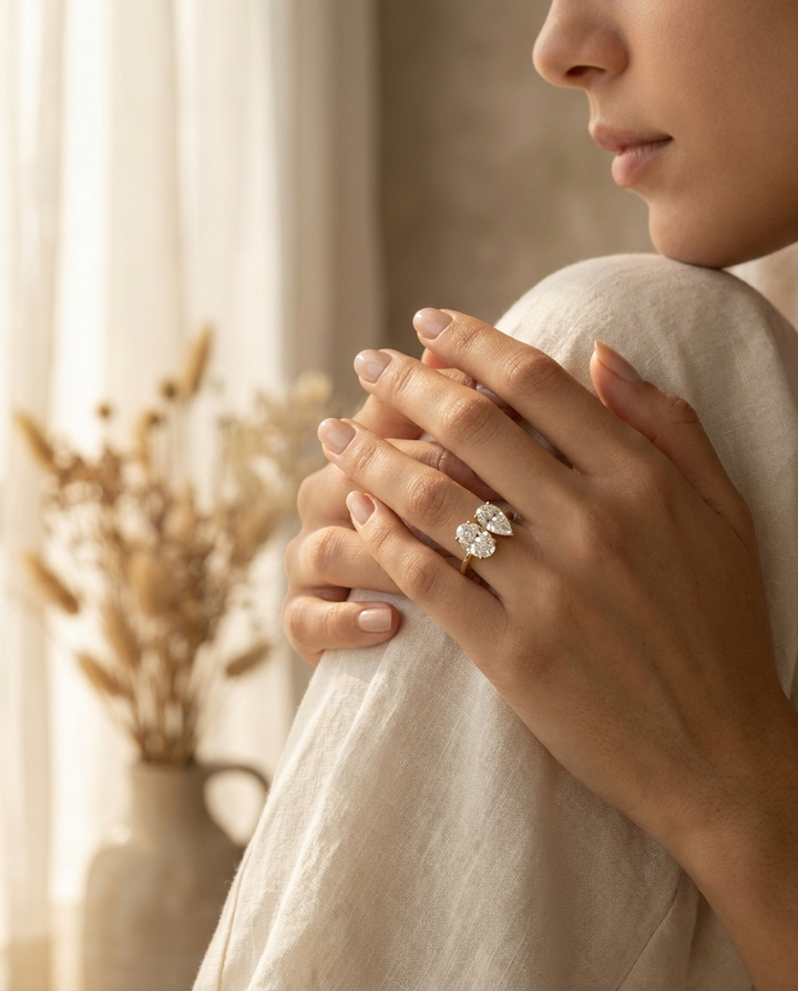 Platinum Solange Toi et Moi Select Oval & Pear Lab Diamond Engagement Ring - Lifestyle scene with hand model
