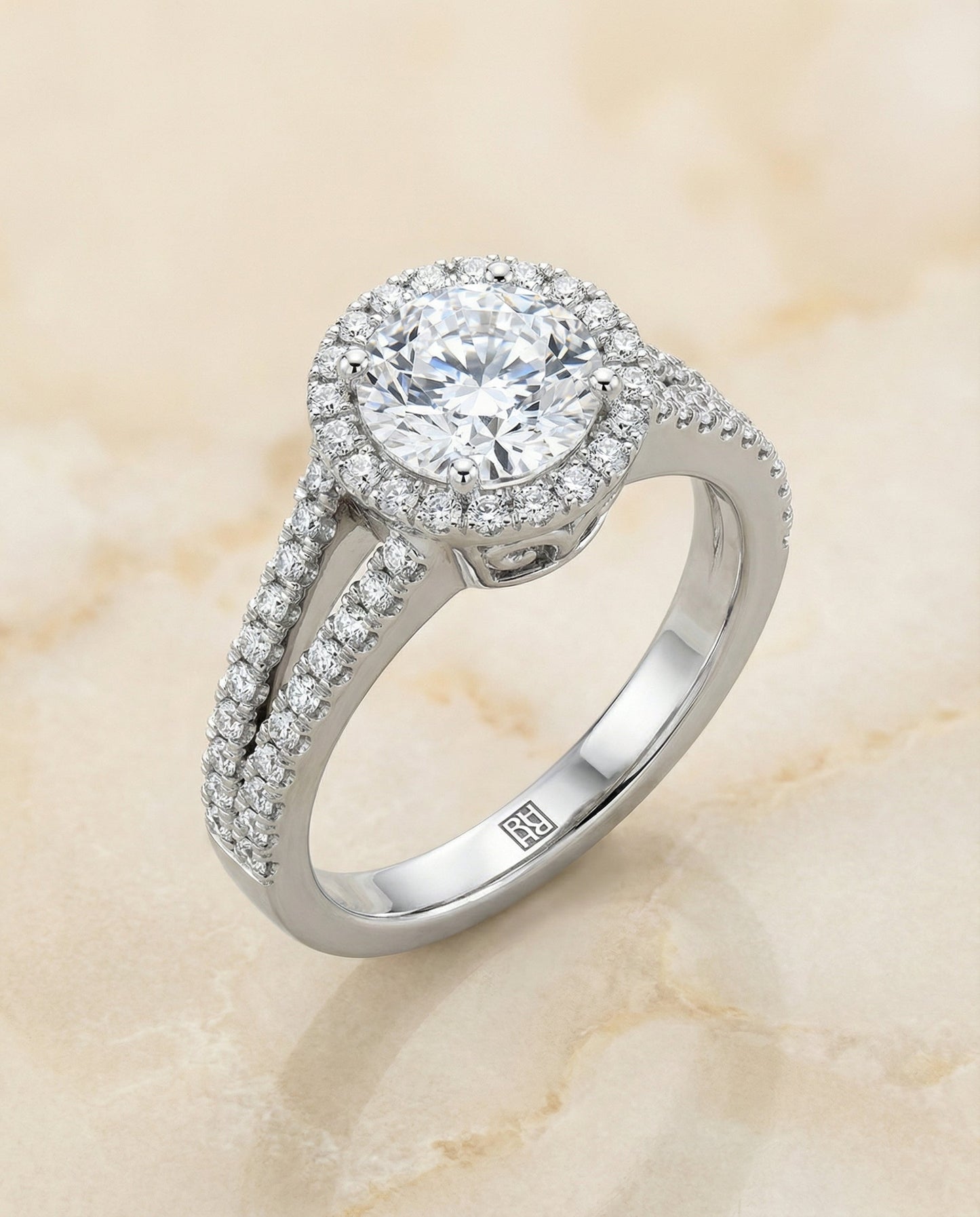 Round Brilliant, Split Shank Pavé Halo Round, in Platinum, pave setting – angled view | RockHer