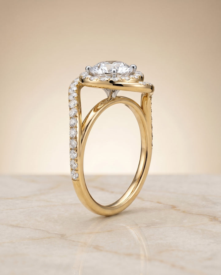 Round Brilliant, Swirl Twist Pavé Halo, in 18K Yellow Gold, pave setting – angled view | RockHer