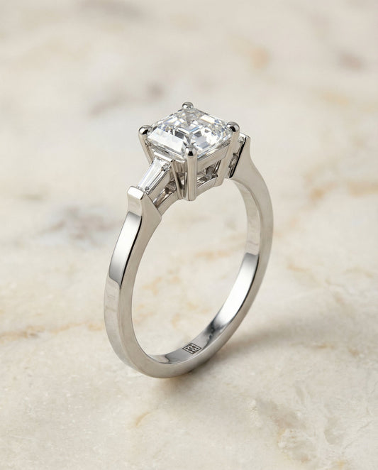 Tapered Baguette Three Stone Asscher, in Platinum, channel setting – front view | RockHer