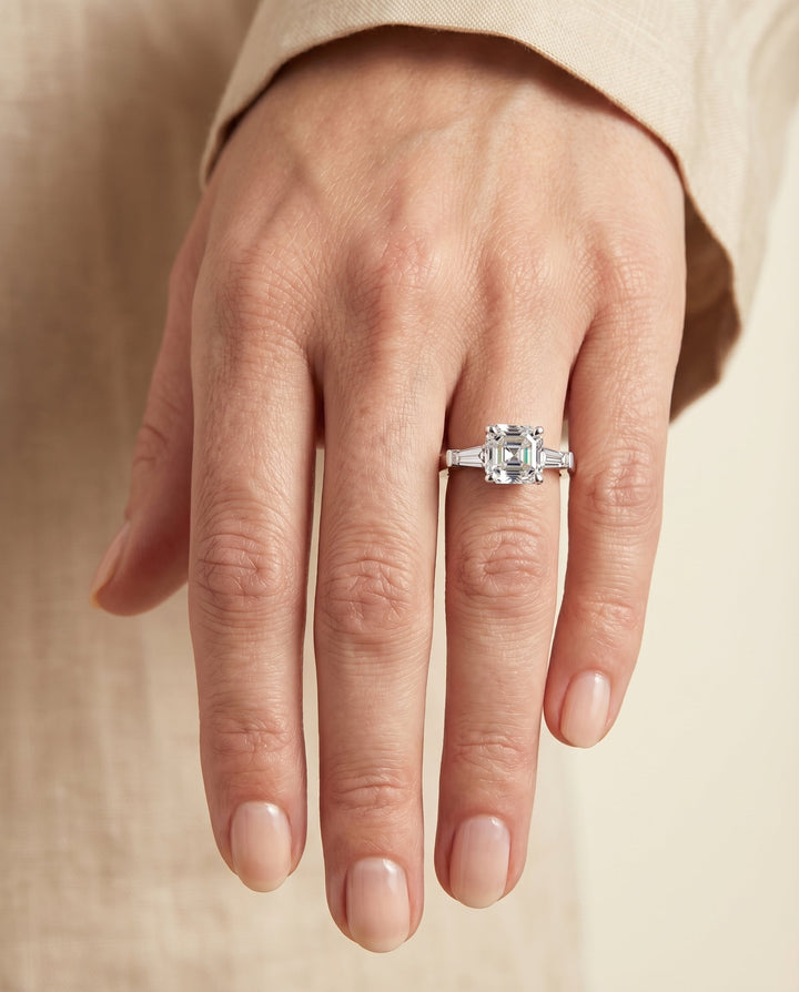 Tapered Baguette Three Stone Asscher, in Platinum, channel setting – lifestyle shot | RockHer
