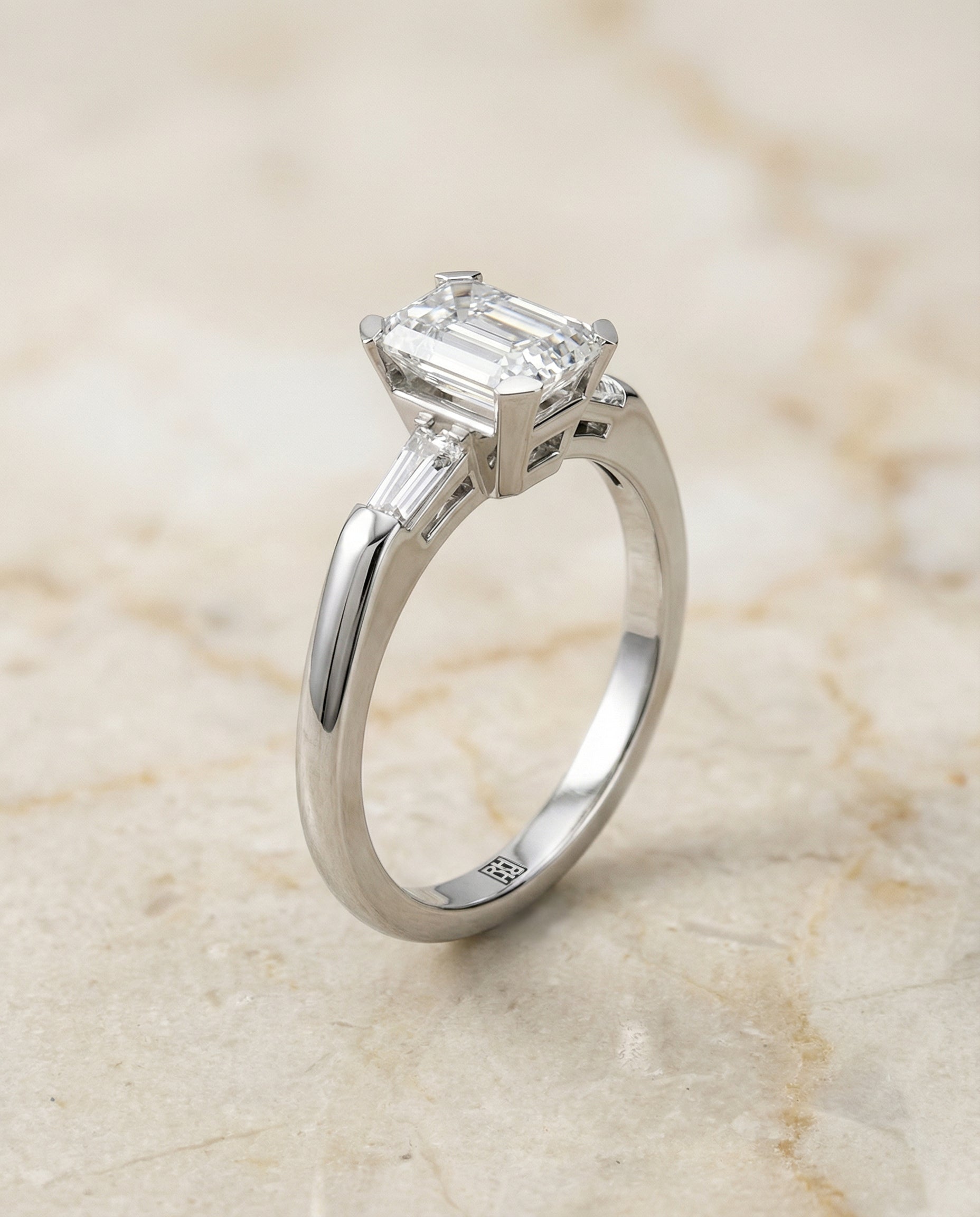 European Cut, Tapered Baguette Three Stone Emerald, in Platinum – front view | RockHer