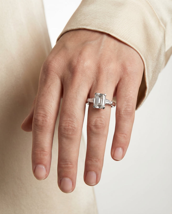 European Cut, Tapered Baguette Three Stone Emerald, in Platinum – lifestyle shot | RockHer