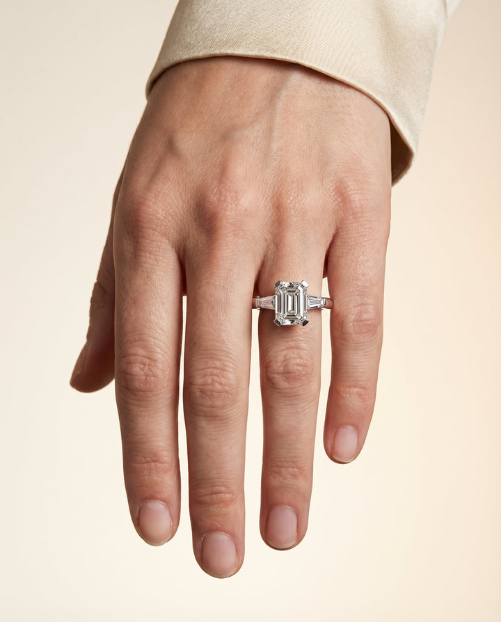 European Cut, Tapered Baguette Three Stone Emerald, in Platinum – lifestyle shot | RockHer