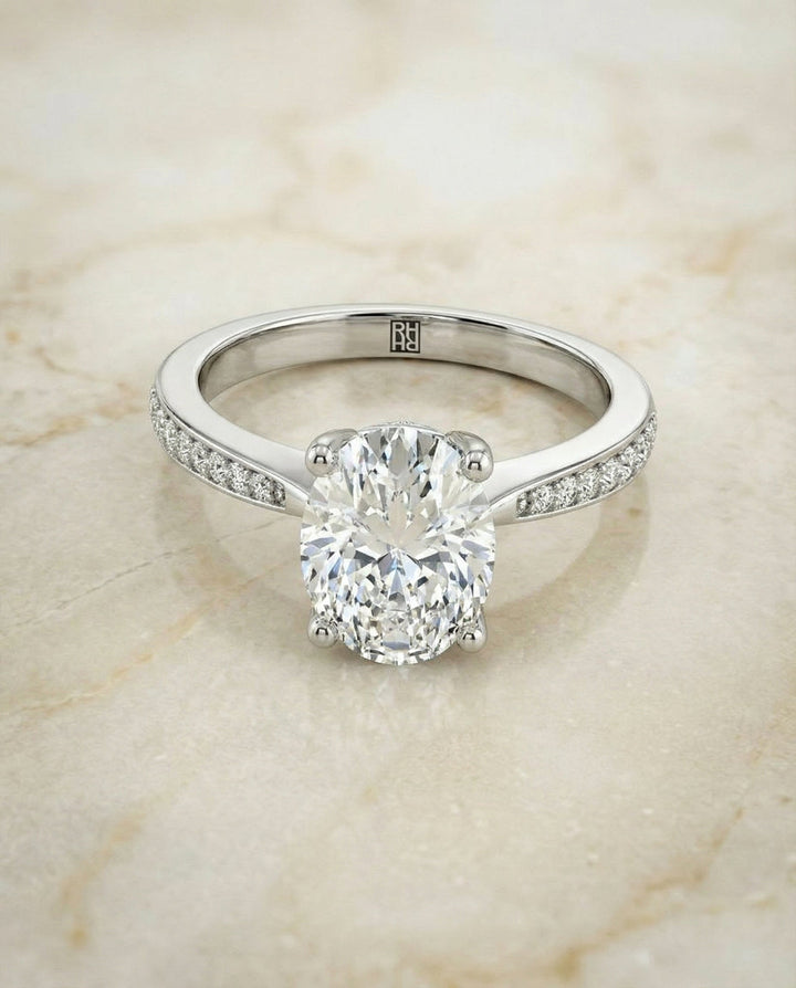 Carrie Select tapered pavé oval oval ring in 14K White Gold — alt angle — RockHer