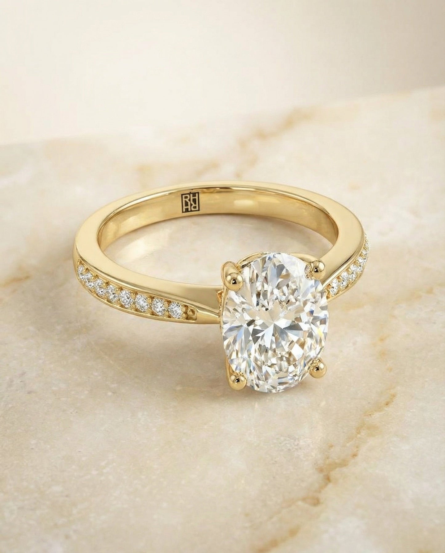 Carrie Select tapered pavé oval oval ring in 14K Yellow Gold — alt angle — RockHer