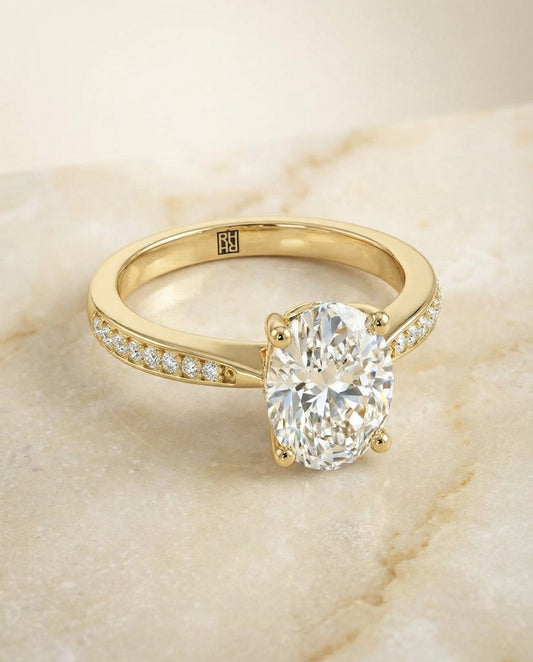 Tapered Pavé Oval, in 18K Yellow Gold, pave setting – angled view | RockHer