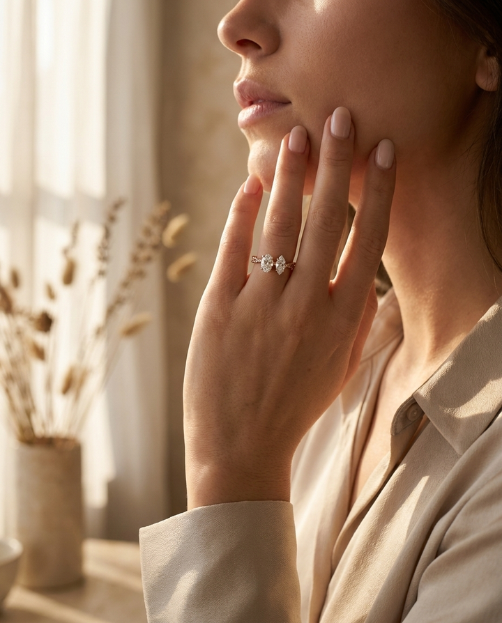 14K Rose Gold Taylor Select Toi et Moi Oval & Marquise Twisted Band Lab Diamond Engagement Ring - Lifestyle scene with hand model