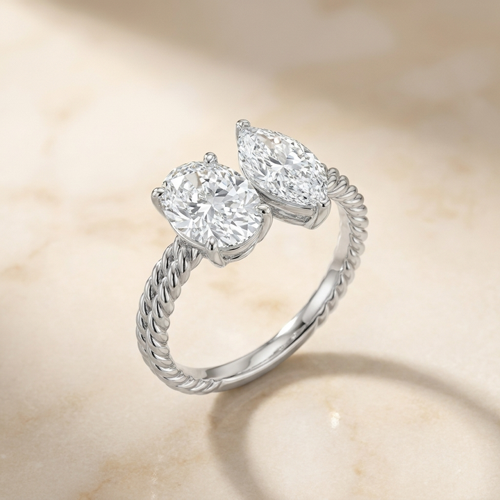 14K White Gold Taylor Select Toi et Moi Oval & Marquise Twisted Band Lab Diamond Engagement Ring - Alt angle on warm marble