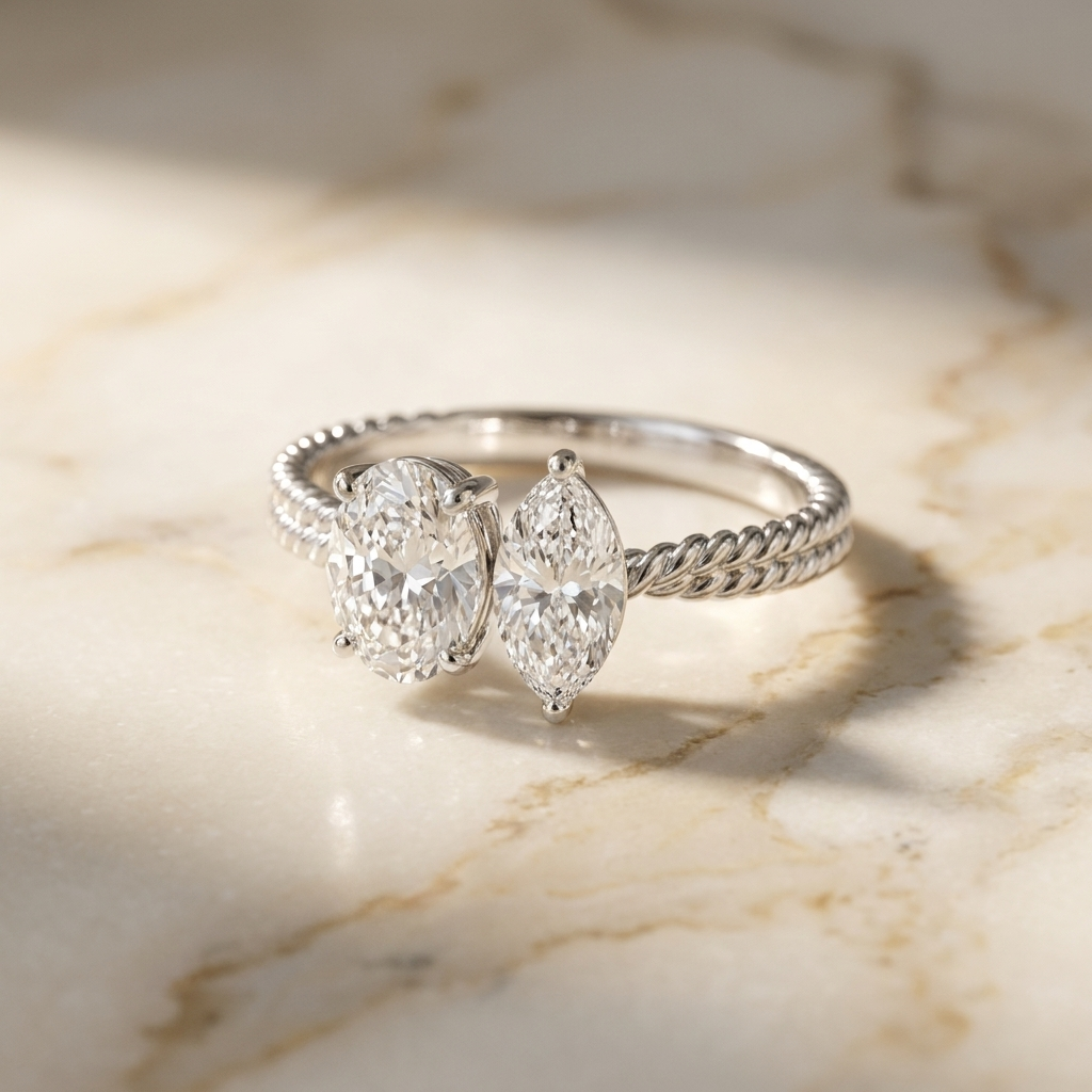 14K White Gold Taylor Select Toi et Moi Oval & Marquise Twisted Band Lab Diamond Engagement Ring - Hero on warm marble