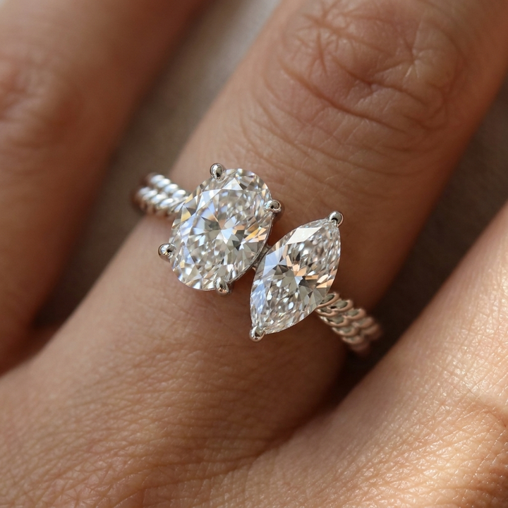 14K White Gold Taylor Select Toi et Moi Oval & Marquise Twisted Band Lab Diamond Engagement Ring - Macro close-up on finger