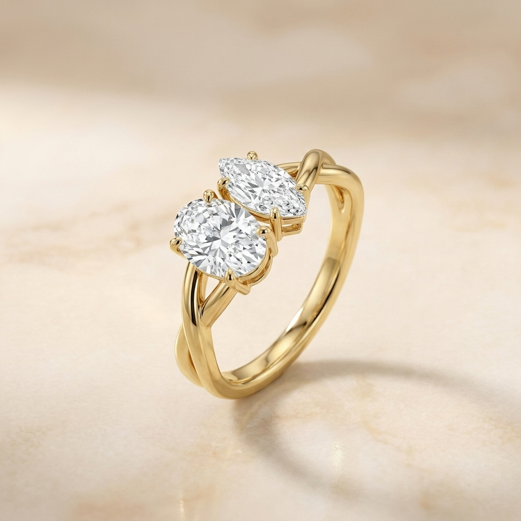 14K Yellow Gold Taylor Select Toi et Moi Oval & Marquise Twisted Band Lab Diamond Engagement Ring - Alt angle on warm marble