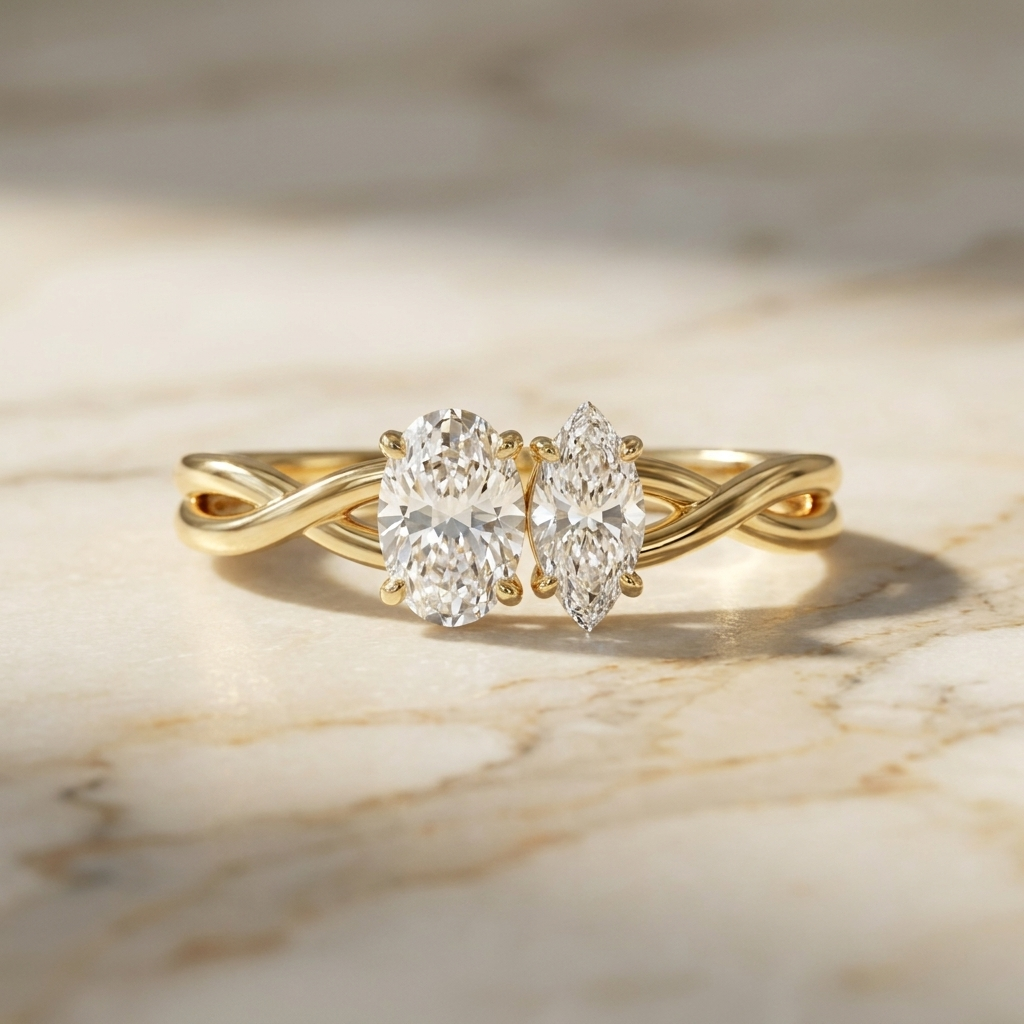 14K Yellow Gold Taylor Select Toi et Moi Oval & Marquise Twisted Band Lab Diamond Engagement Ring - Hero on warm marble