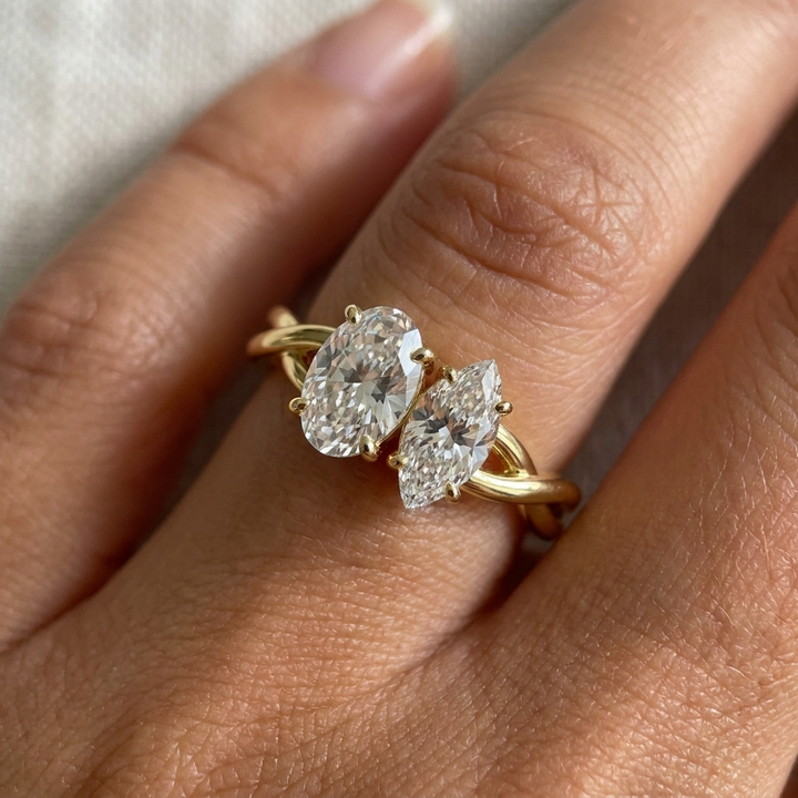 14K Yellow Gold Taylor Select Toi et Moi Oval & Marquise Twisted Band Lab Diamond Engagement Ring - Macro close-up on finger