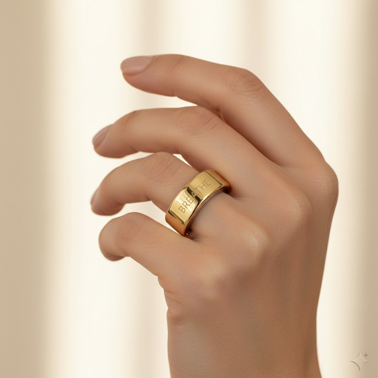 BREATHE engraved 14K Yellow Gold Oura Ring cover worn on hand