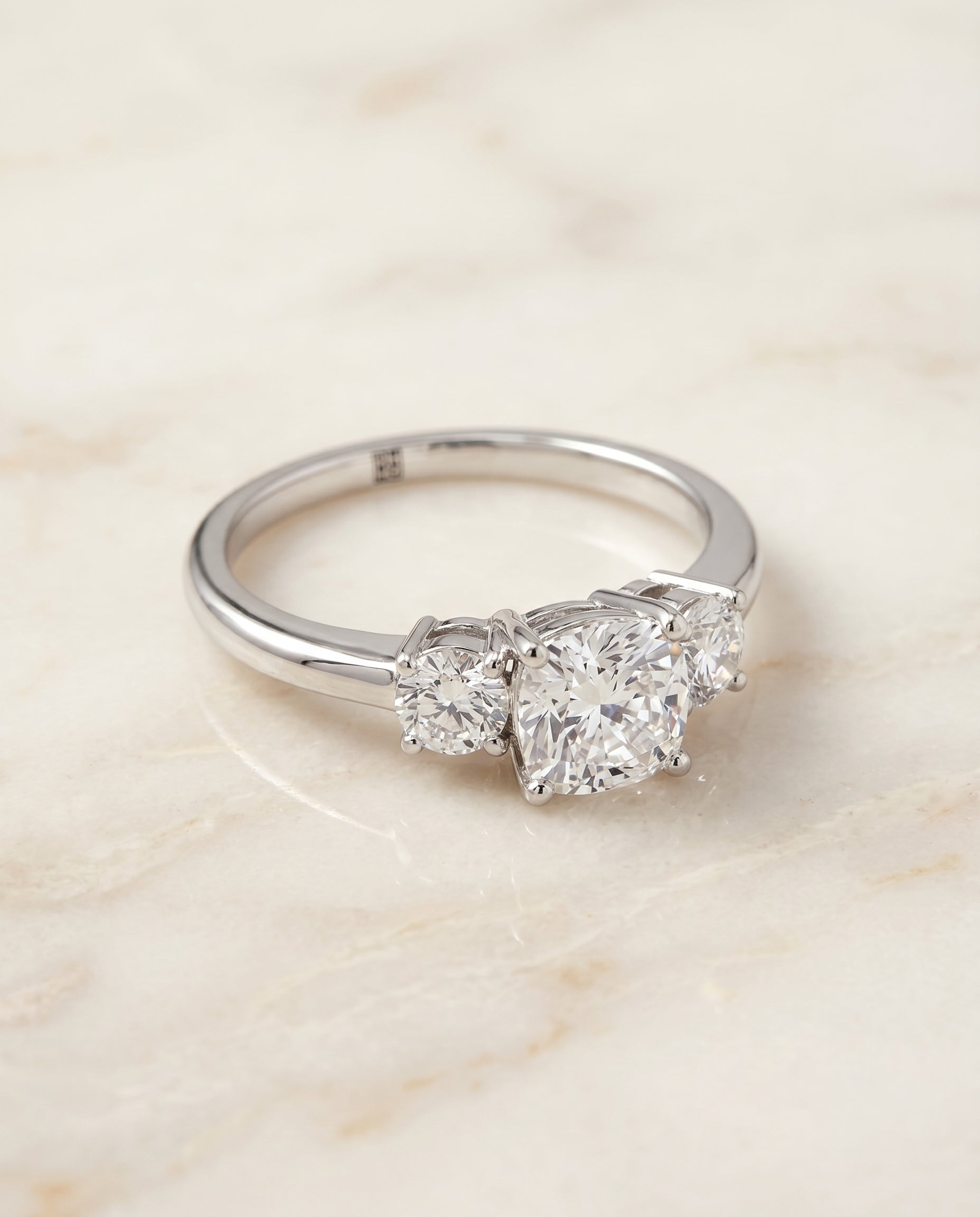 Anita Select Classic Three Stone Cushion Solitaire in Platinum – view 1