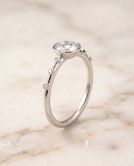 Brandi Select Bezel Accent Solitaire in 18K White Gold – view 1