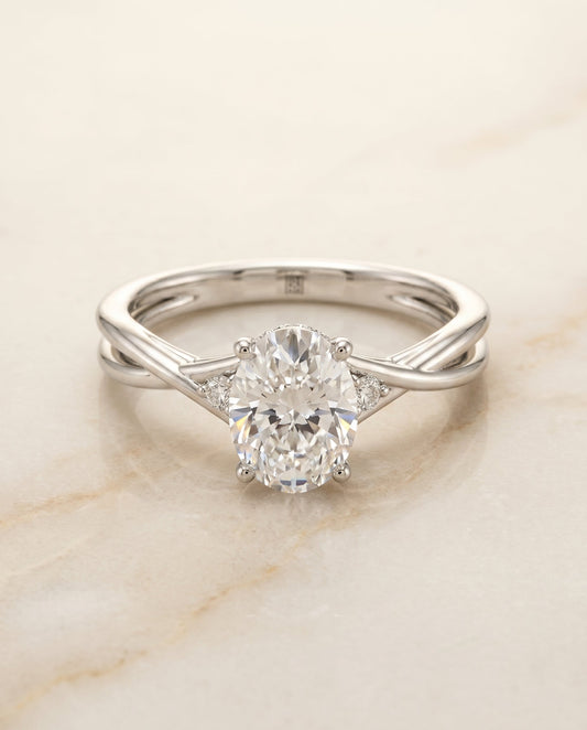 The Dusty Twisted Hidden Halo Solitaire Engagement Ring Setting for Oval Diamonds in 18K White Gold | RockHer