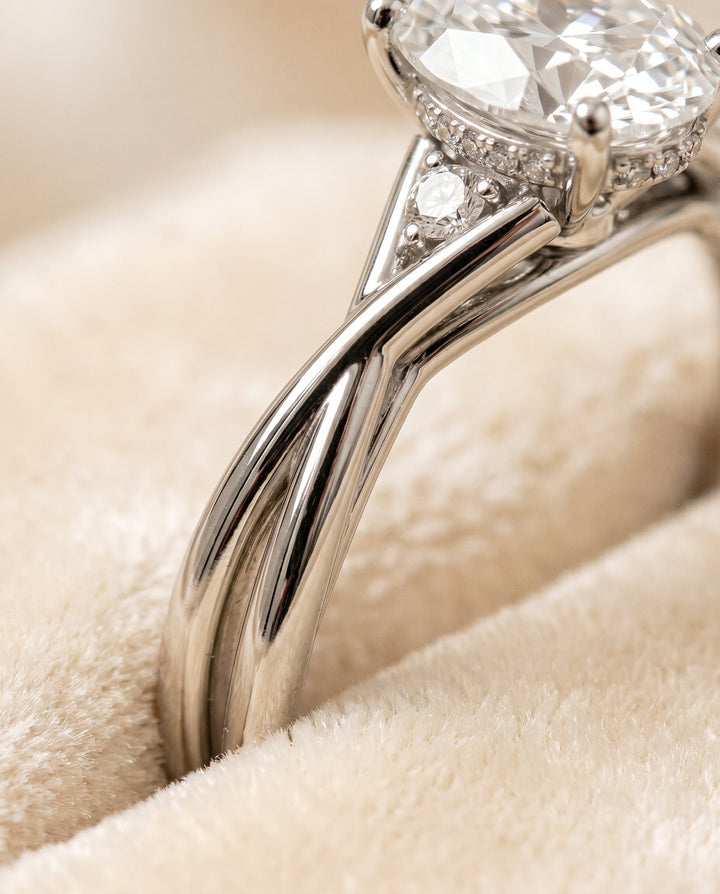 Dusty Select Twisted Shank Hidden Halo Solitaire Oval in 18K White Gold – view 4