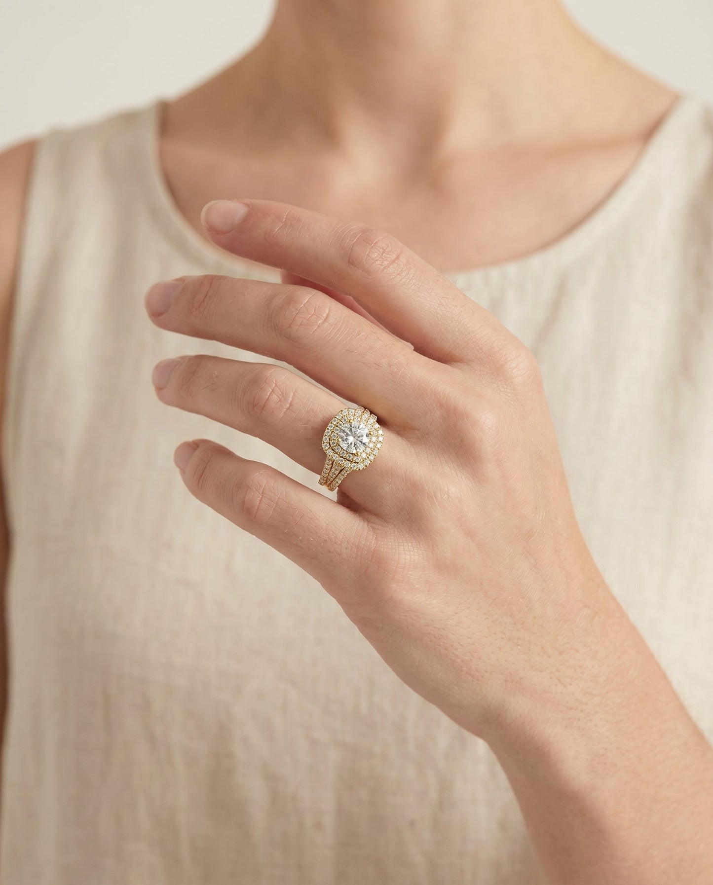 Round Brilliant, Four Row Double Halo, in 18K Yellow Gold, pave setting – lifestyle shot | RockHer
