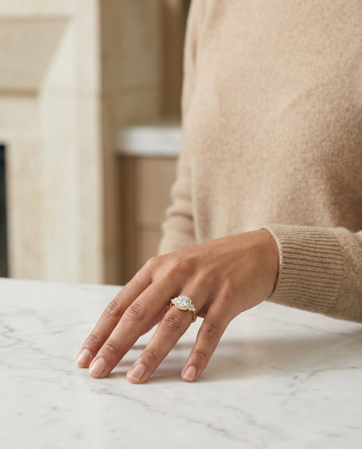 Round Brilliant, Open Twisted Triple Halo, in 18K Yellow Gold, pave setting – lifestyle shot | RockHer