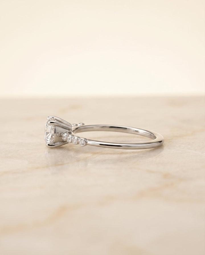 Peggy Select Bezel Accent Solitaire Emerald Cut in 18K White Gold – view 6