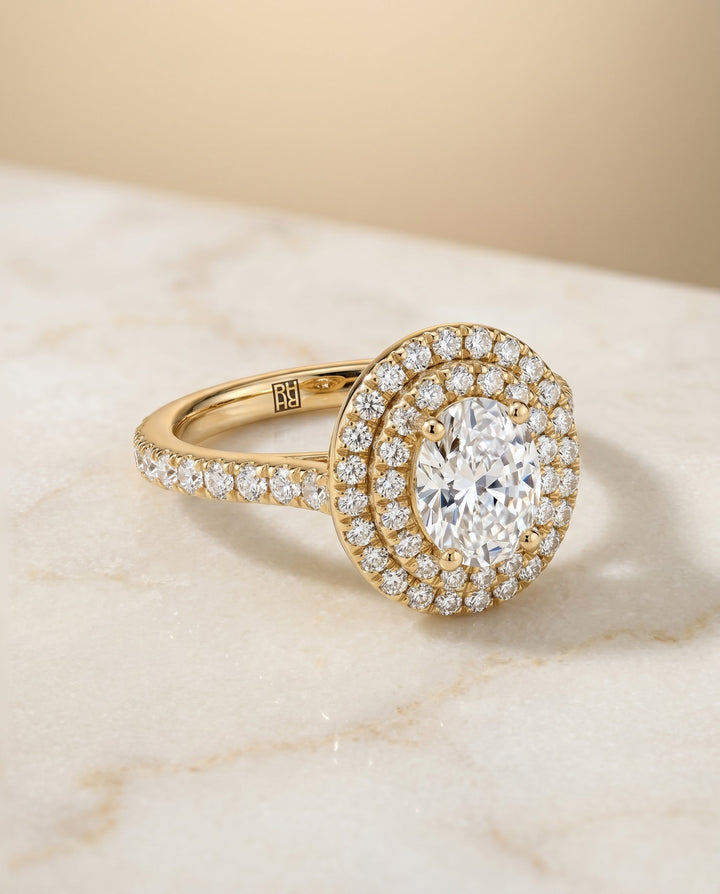 The Whitney Pavé Halo Engagement Ring Setting for Oval Diamonds in 18K Yellow Gold
