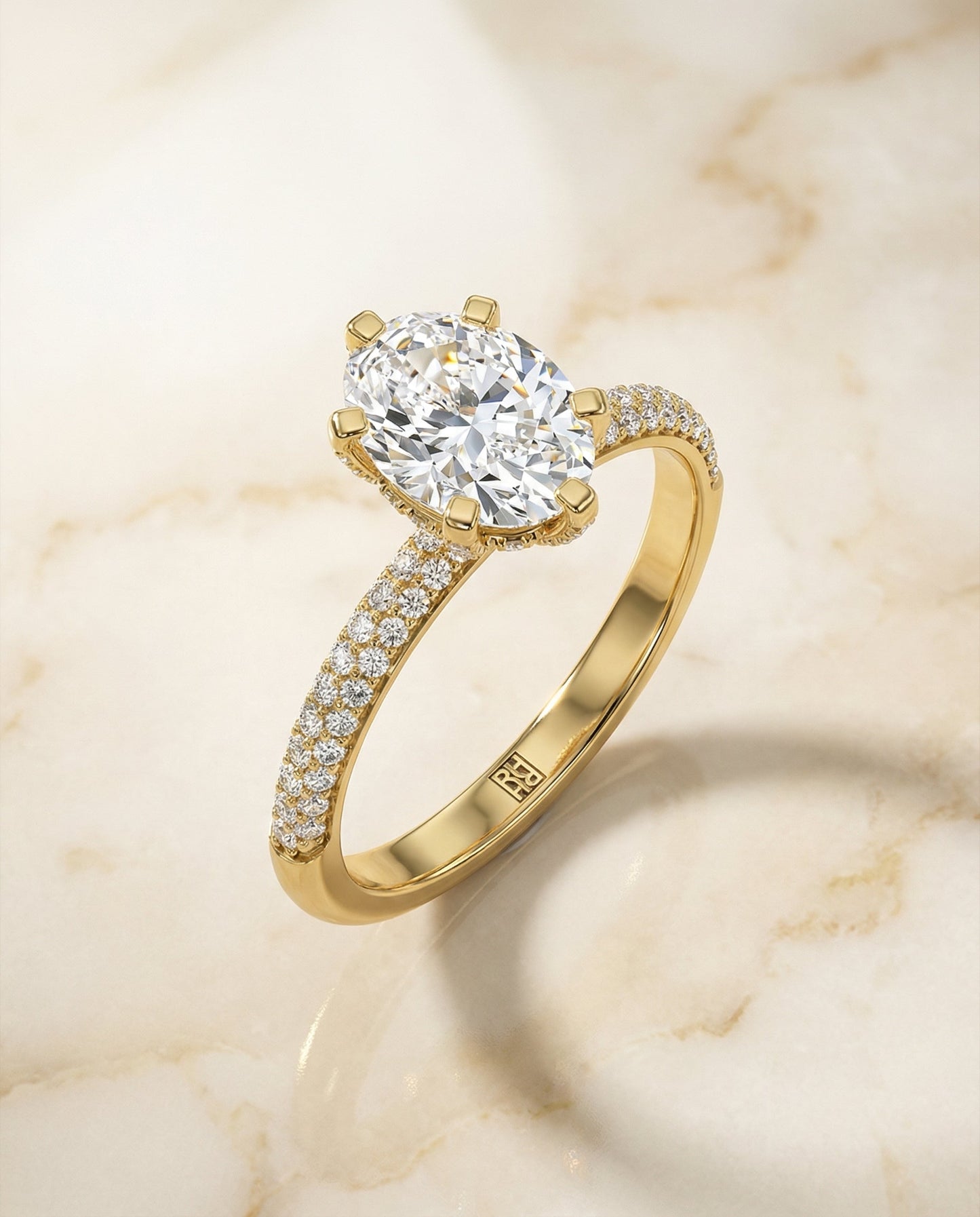 Three Row French Pavé Oval, in 18K Yellow Gold – angled view | RockHer