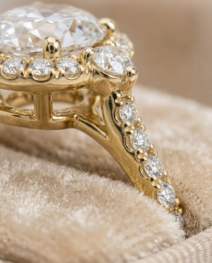 Three Stone Delicate Halo Oval, in 18K Yellow Gold – detail view | RockHer