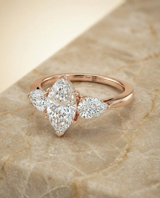 Three Stone Matched Shape Marquise, in 14K Rose Gold, prong setting – angled view | RockHer