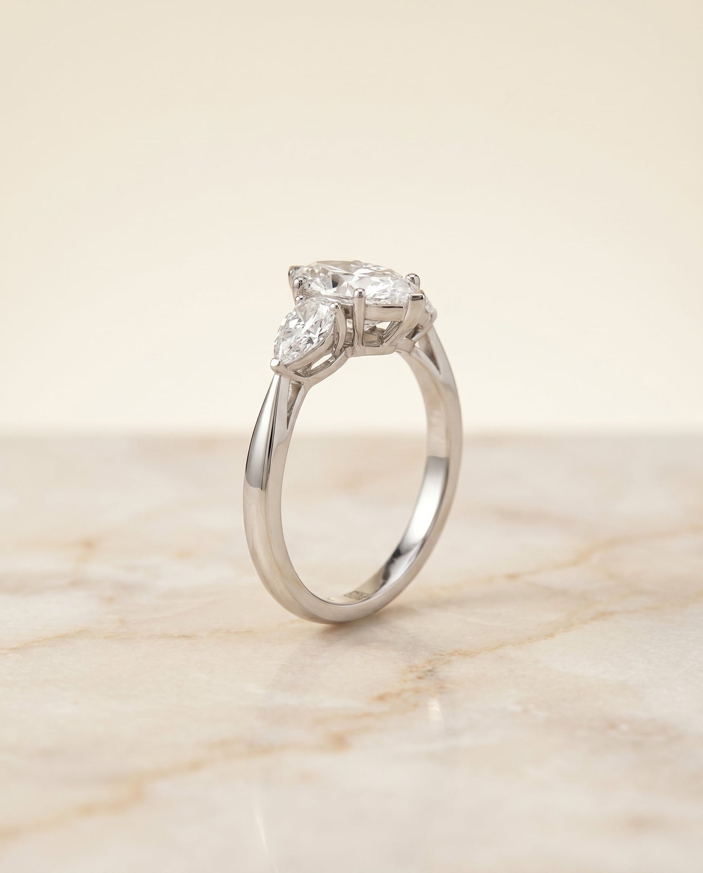 Three Stone Matched Shape Marquise, in Platinum, prong setting – angled view | RockHer