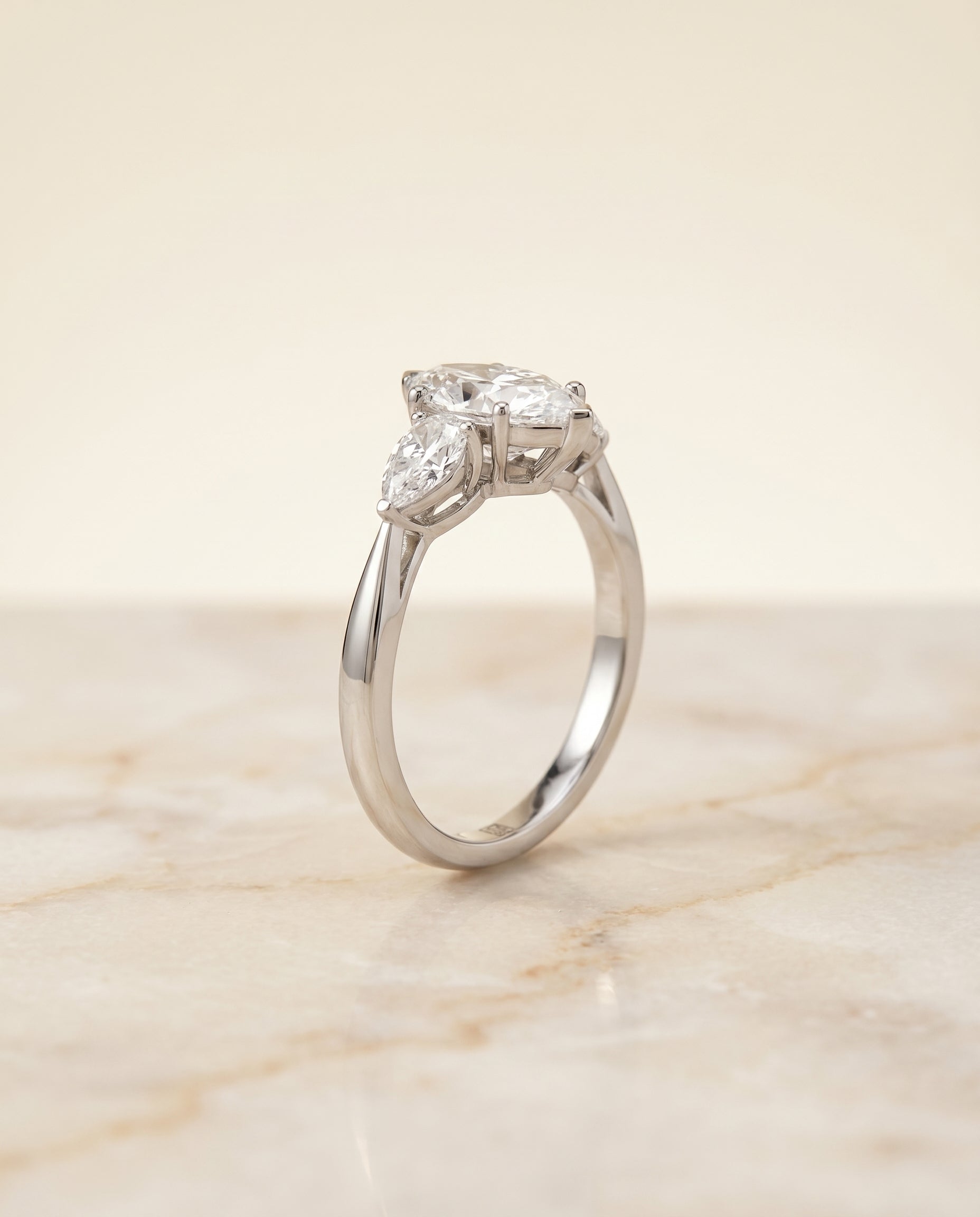 Three Stone Matched Shape Marquise, in Platinum, prong setting – angled view | RockHer