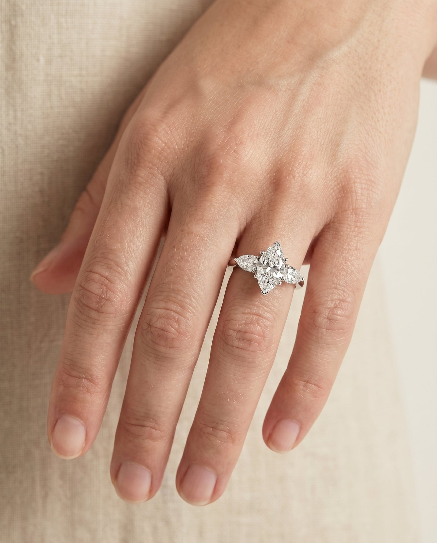 Three Stone Matched Shape Marquise, in Platinum, prong setting – lifestyle shot | RockHer