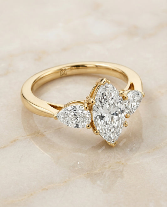 Three Stone Matched Shape Marquise, in 18K Yellow Gold, prong setting – angled view | RockHer