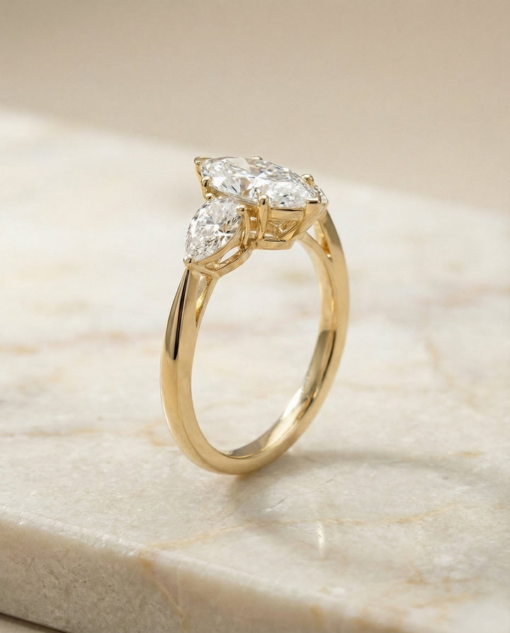 Three Stone Matched Shape Marquise, in 18K Yellow Gold, prong setting – front view | RockHer