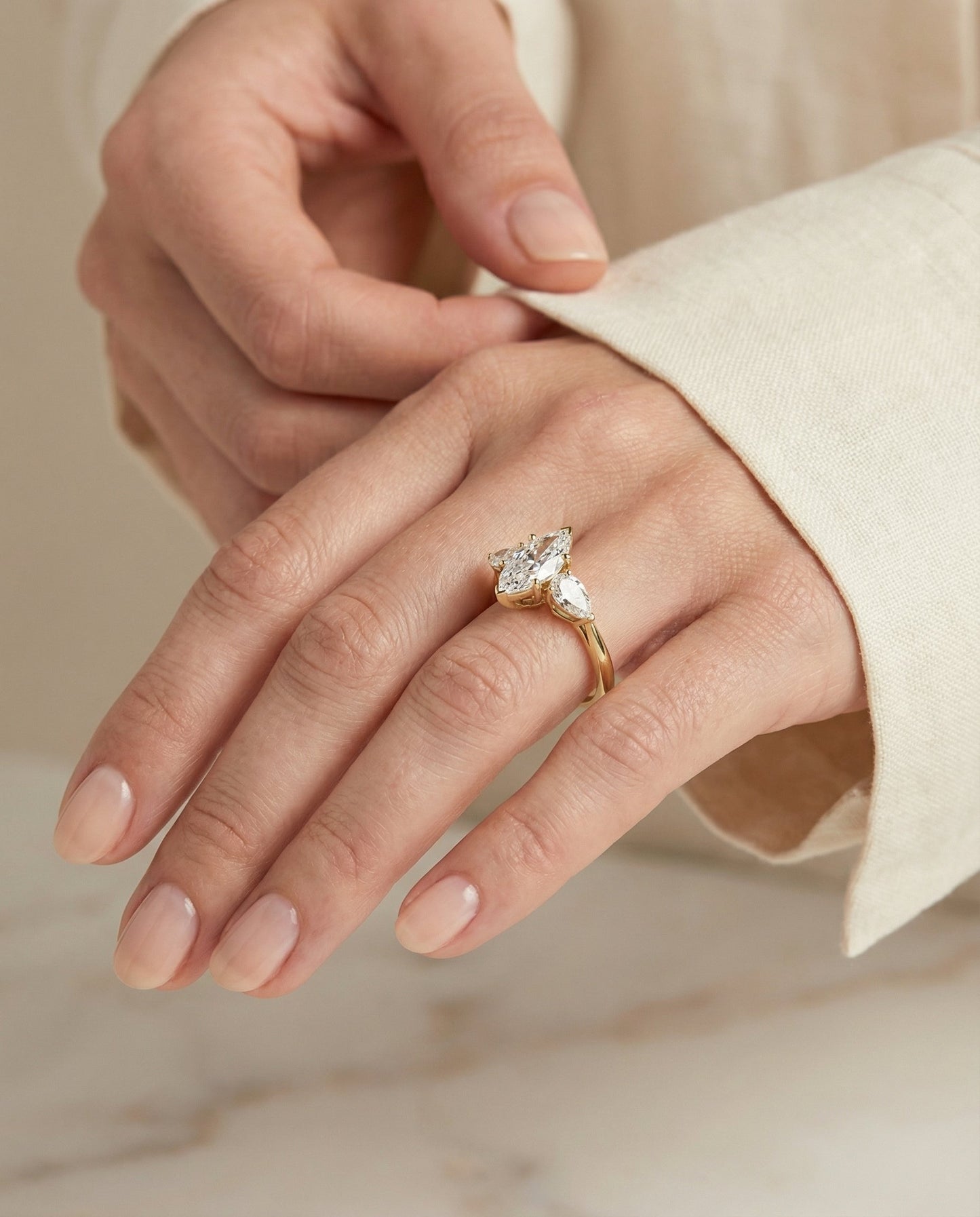 Three Stone Matched Shape Marquise, in 18K Yellow Gold, prong setting – lifestyle shot | RockHer